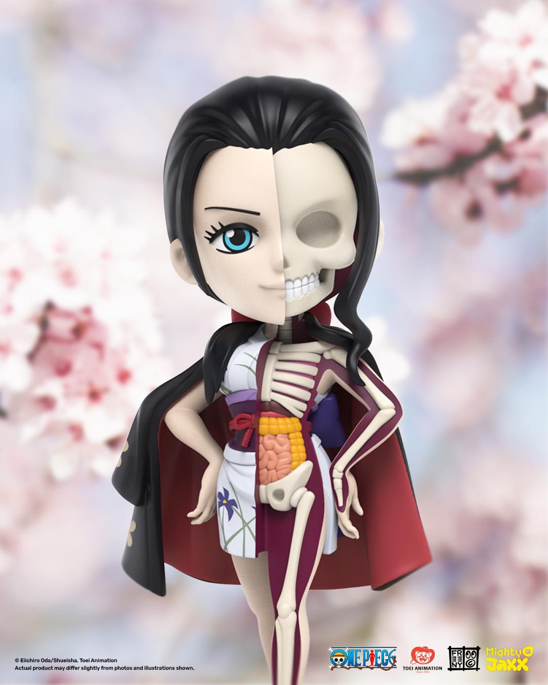 A picture containing anime, doll, toy, cartoon

Description automatically generated