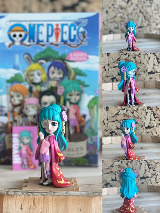 A toy figurine of a cartoon character

Description automatically generated