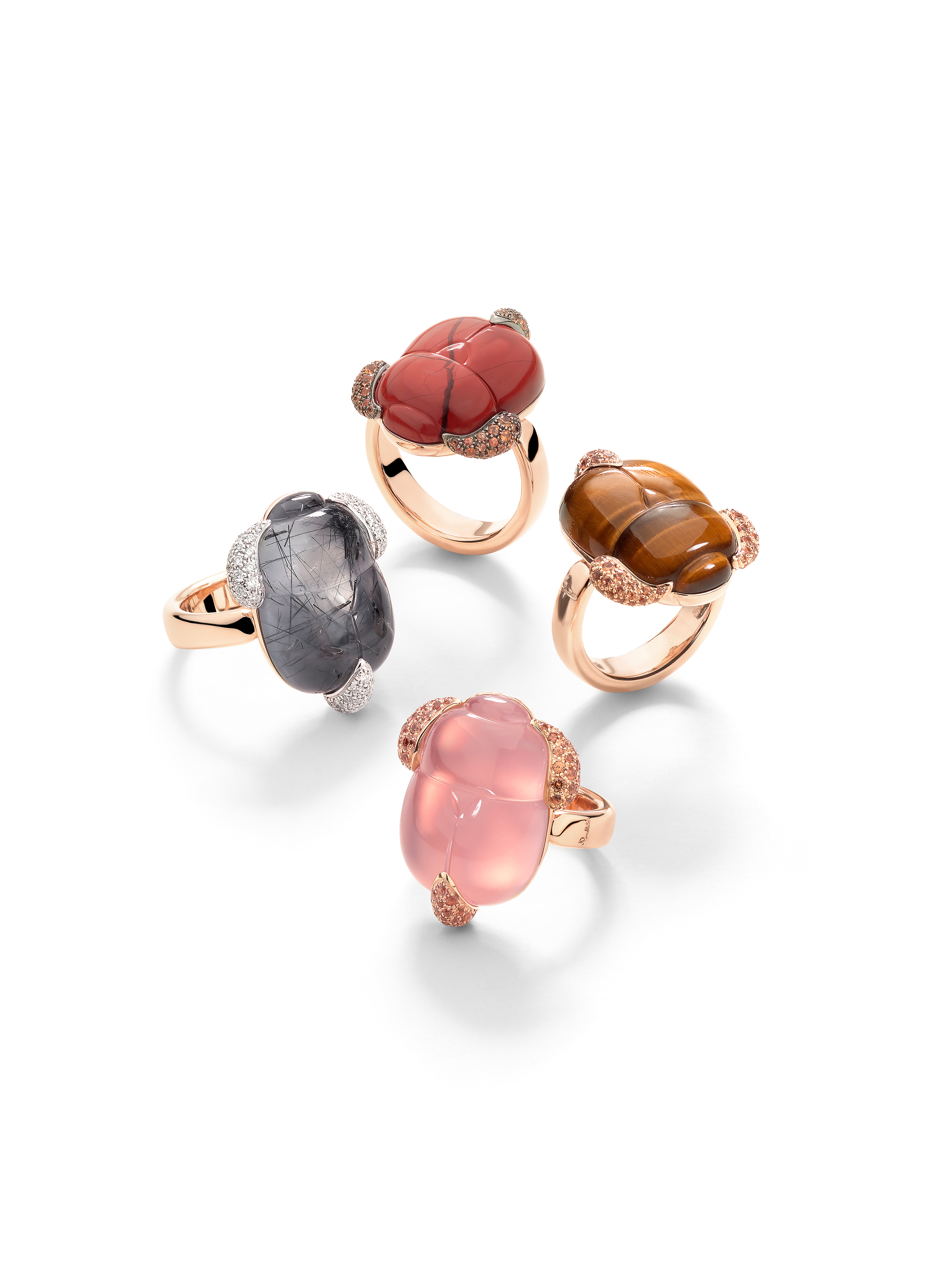 A group of rings with different colored stones

Description automatically generated