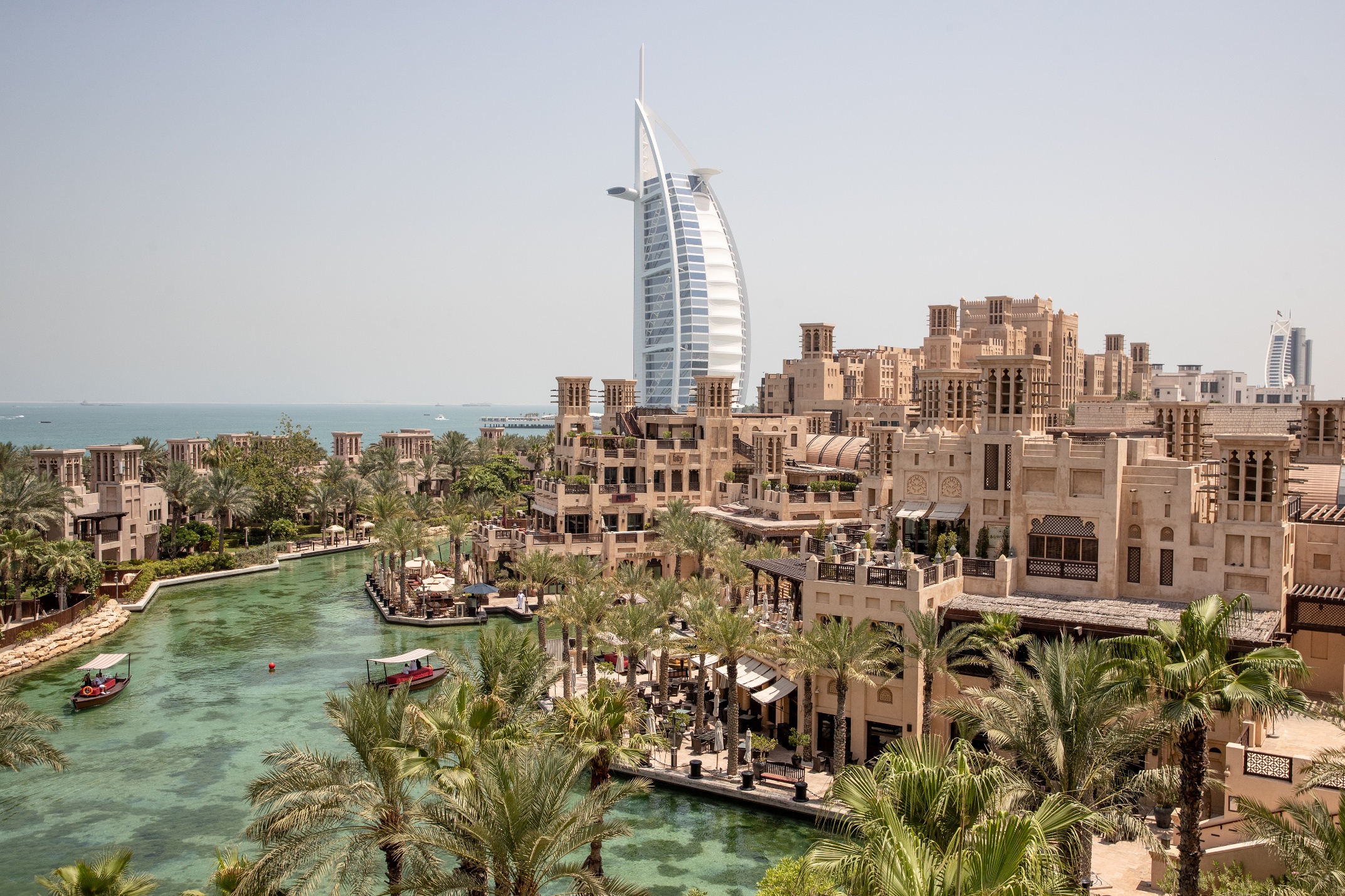 A city with a body of water AI-generated content may be incorrect.