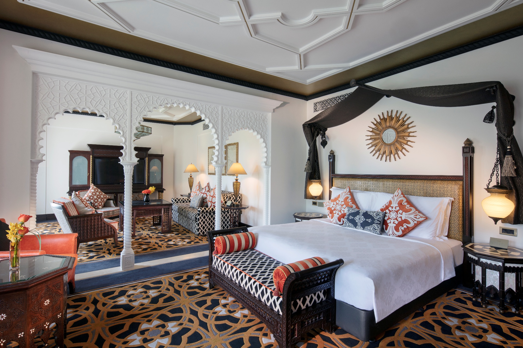 A room with a bed and a mirror AI-generated content may be incorrect.