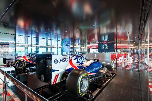 A race car in a showroom

AI-generated content may be incorrect.