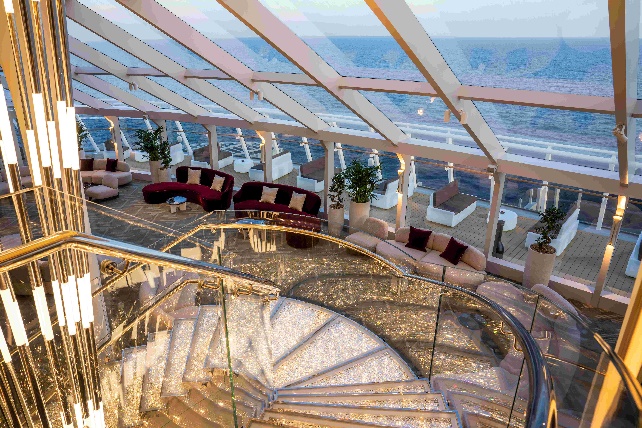 A room with a glass wall and a staircase

AI-generated content may be incorrect.