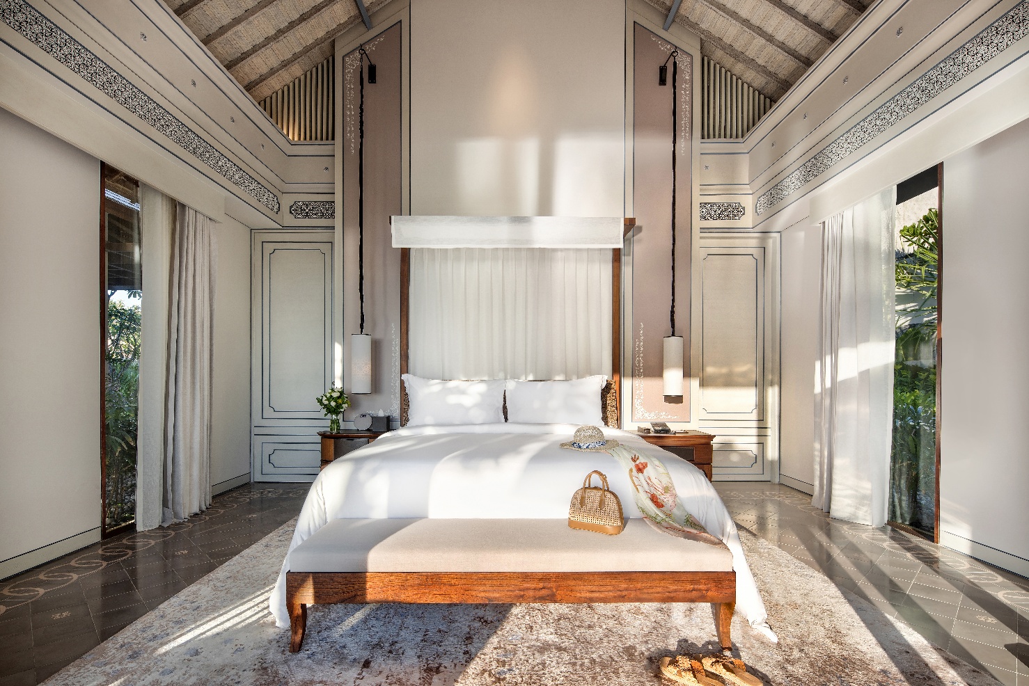 A bedroom with a bed and a rug AI-generated content may be incorrect.