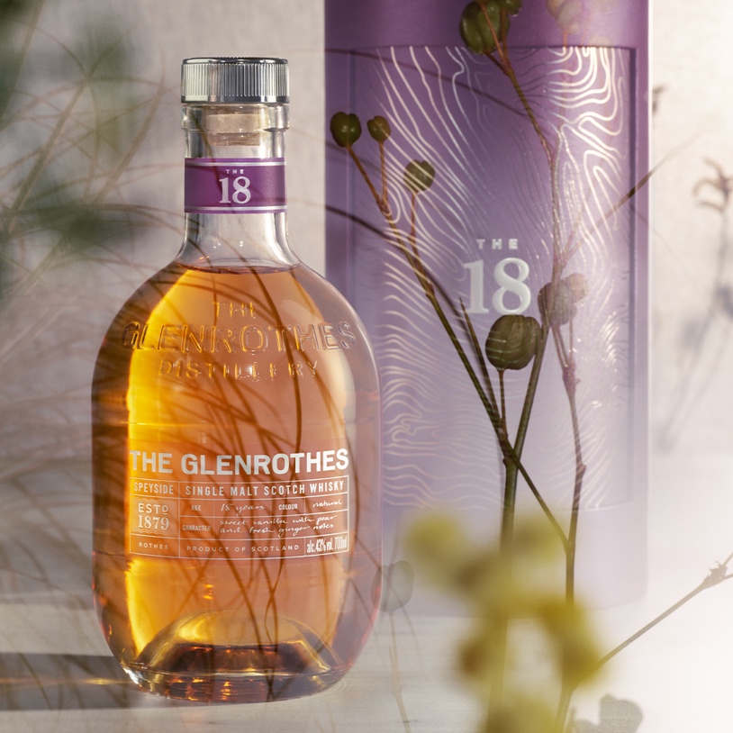 A bottle of alcohol

AI-generated content may be incorrect.