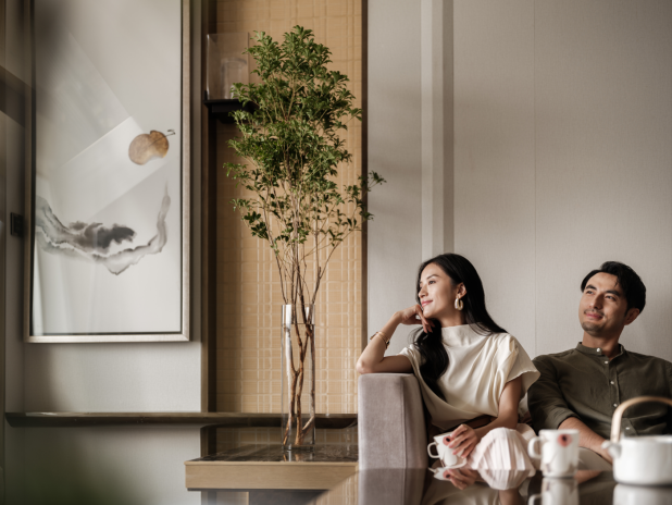 A person and person sitting on a couch AI-generated content may be incorrect.