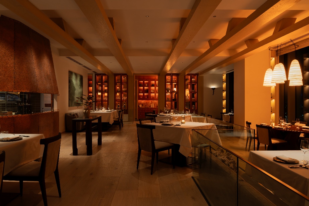 A restaurant with tables and chairs AI-generated content may be incorrect.