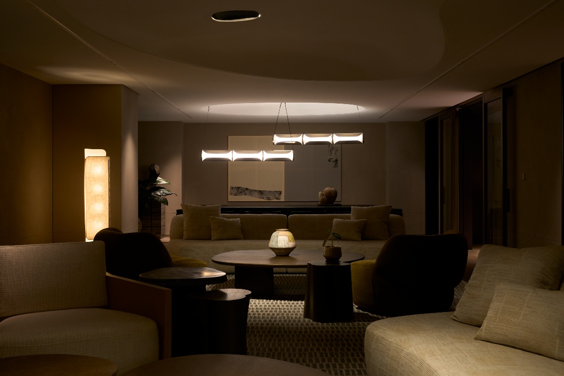 A room with a round table and chairs AI-generated content may be incorrect.