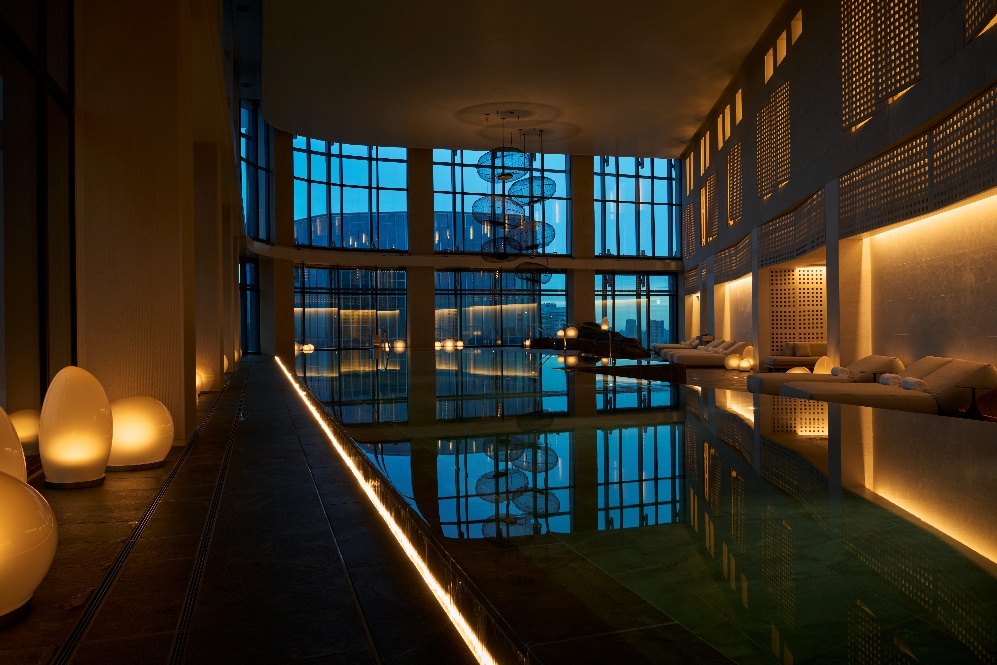A pool inside a building AI-generated content may be incorrect.