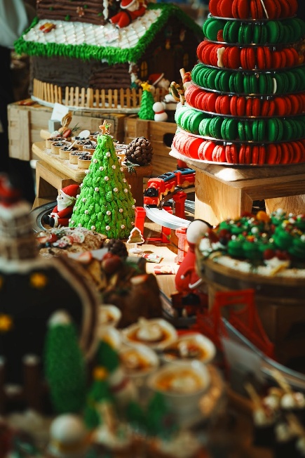 A table with food and desserts AI-generated content may be incorrect.