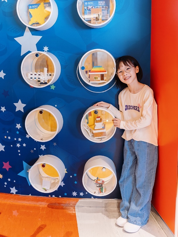 图片包含 人, 橙子, 桌子, 食物 AI 生成的内容可能不正确。